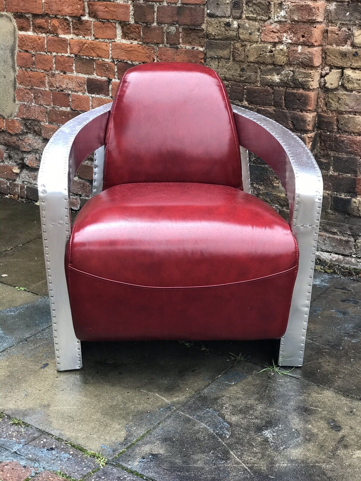 Aviators Armchair, Aluminium With Red Leather Upholstery.