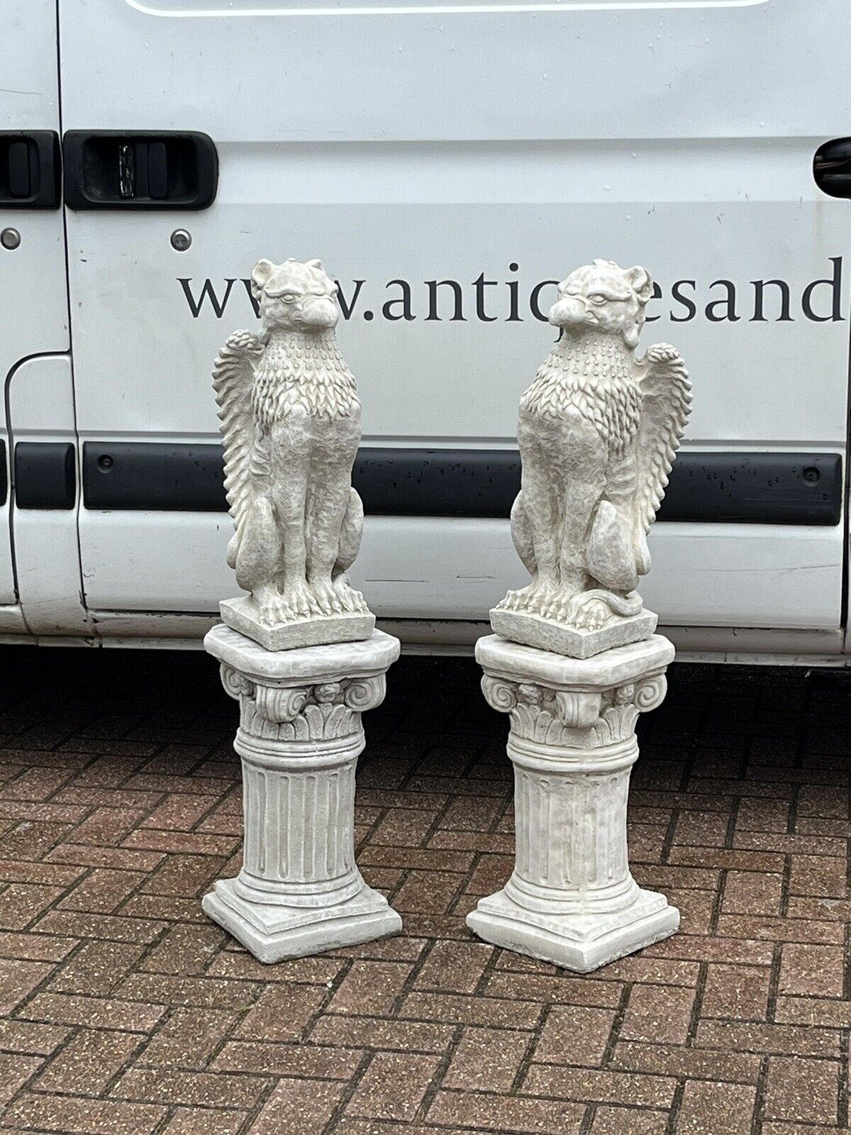 Pair Of Griffins On Architectural Columns