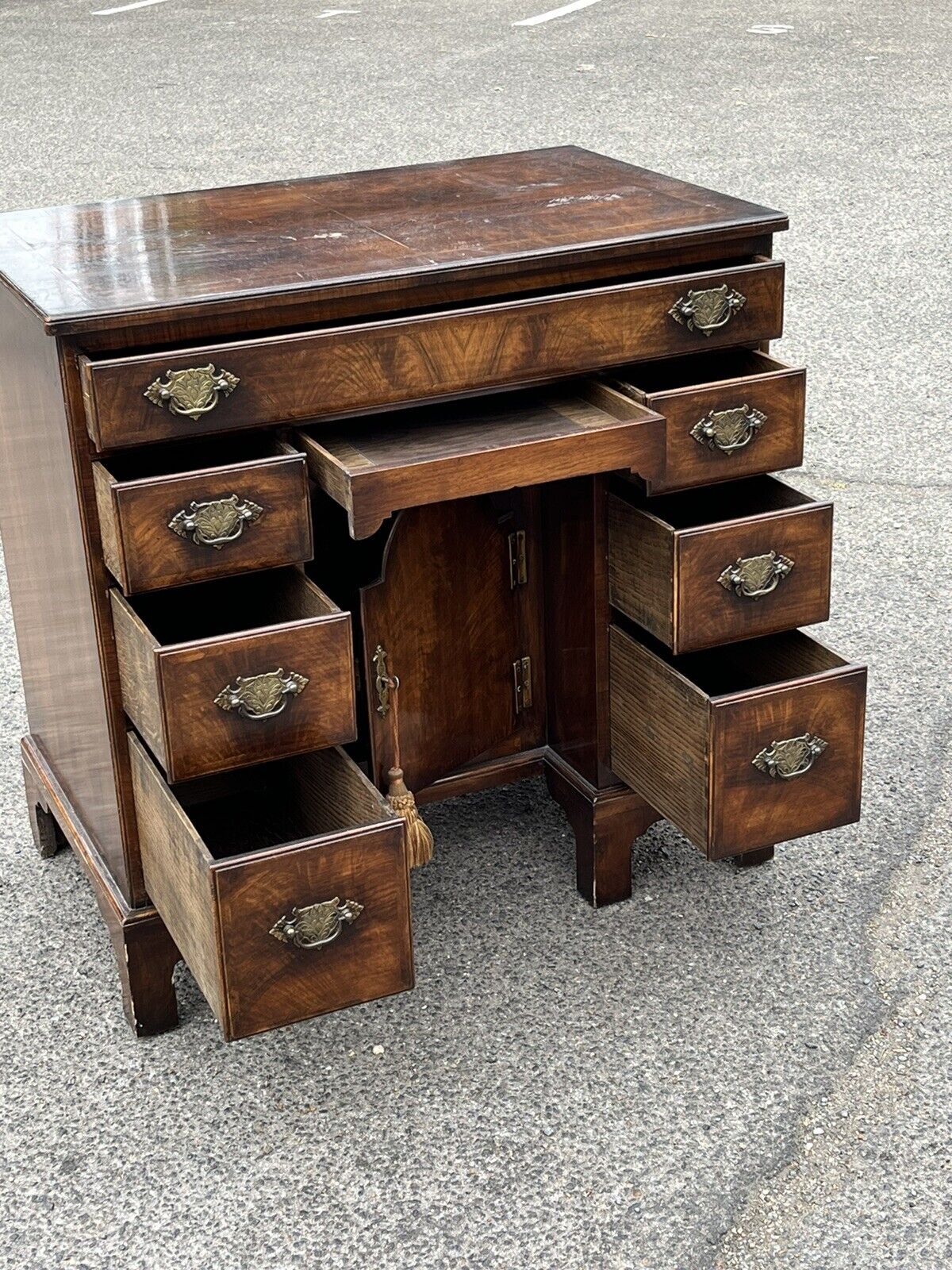 Walnut Kneehole Desk, Bracket Feet With Brass Handles.