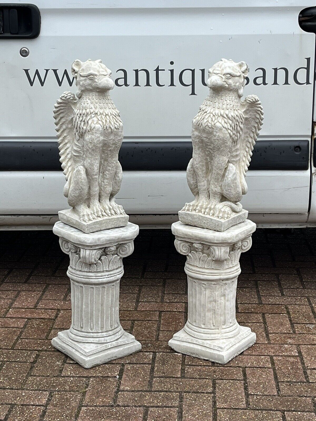 Pair Of Griffins On Architectural Columns