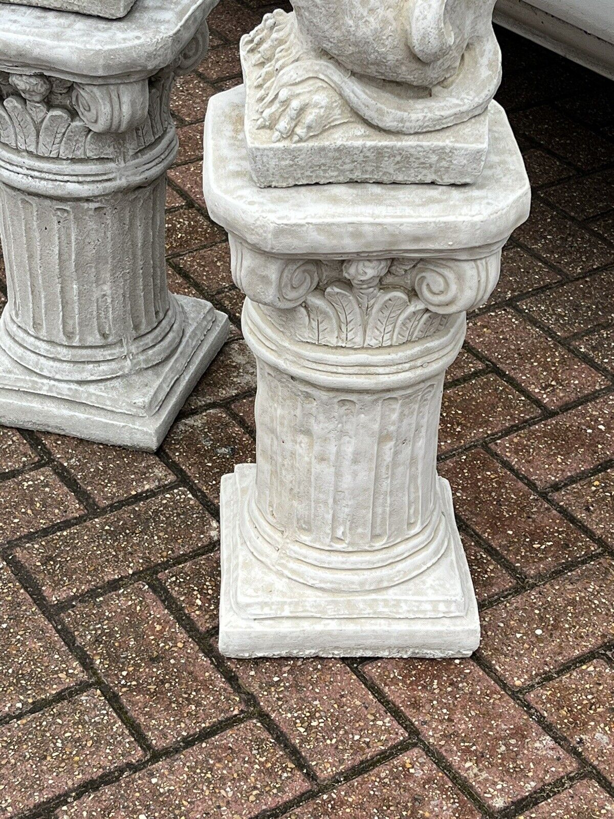 Pair Of Griffins On Architectural Columns