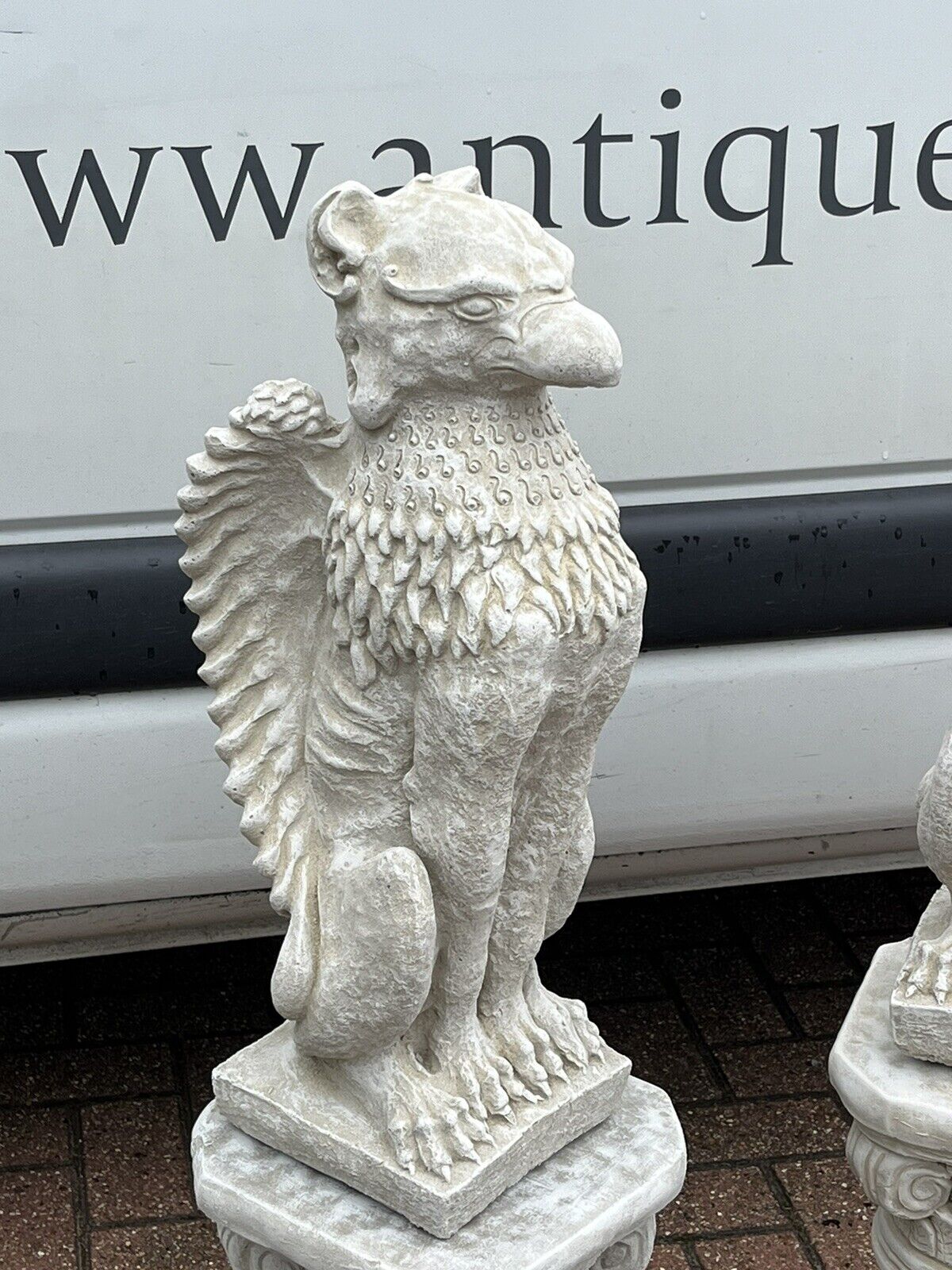 Pair Of Griffins On Architectural Columns