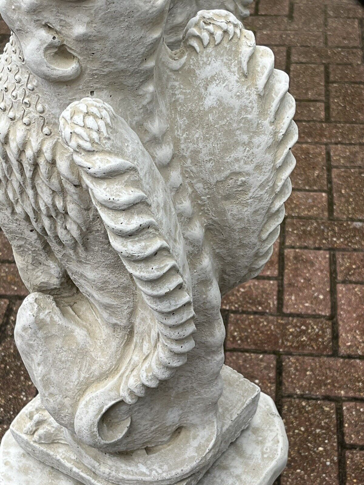 Pair Of Griffins On Architectural Columns