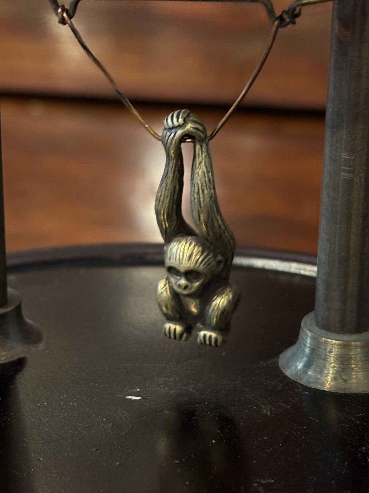 Skeleton Clock In Case With Swinging Monkey Pendulum.