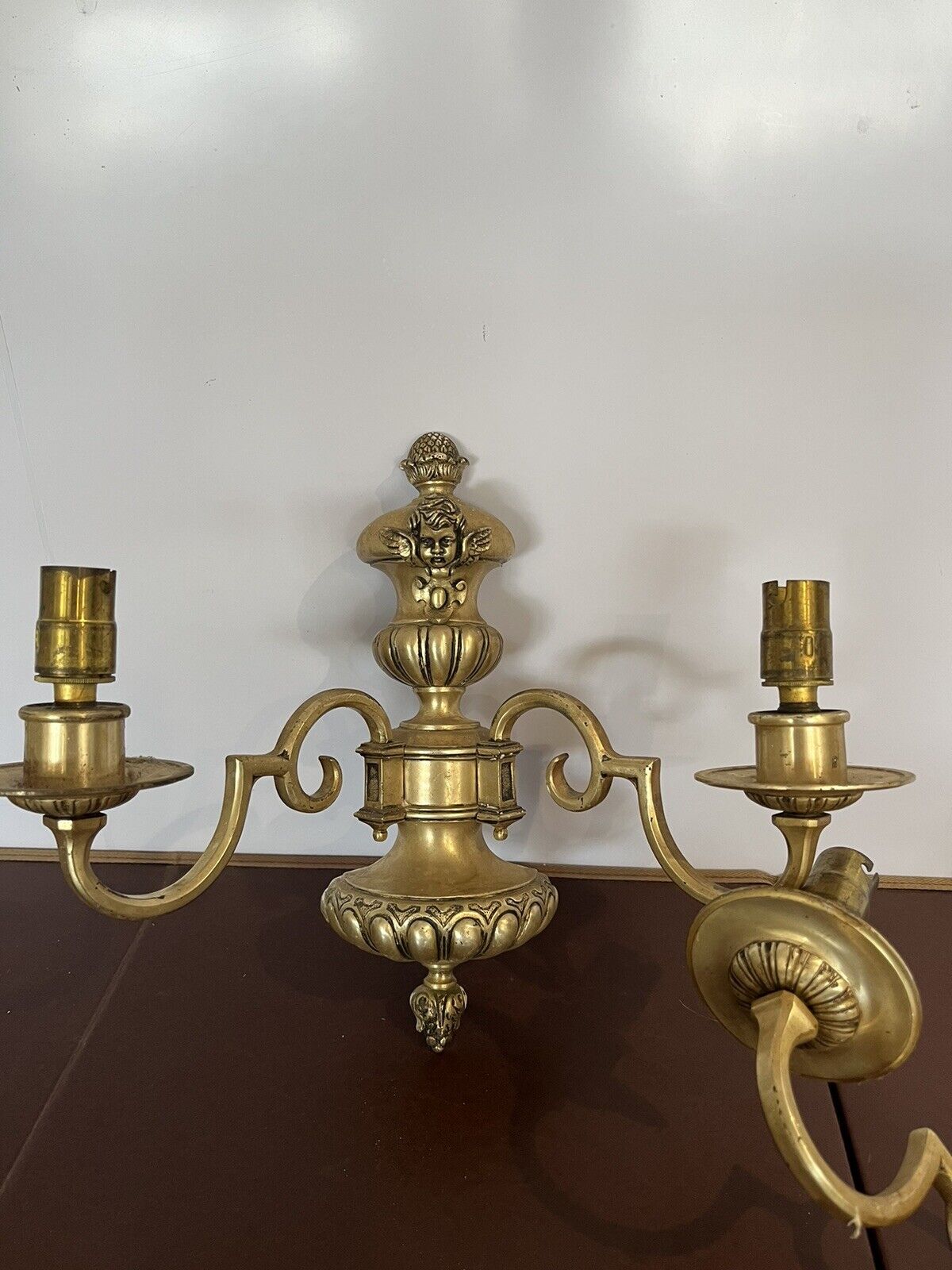 Pair Of Brass Cherub Wall Light Sconces.