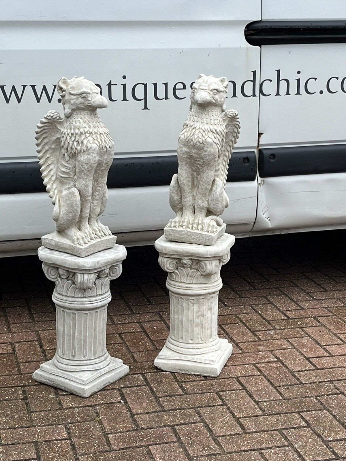 Pair Of Griffins On Architectural Columns