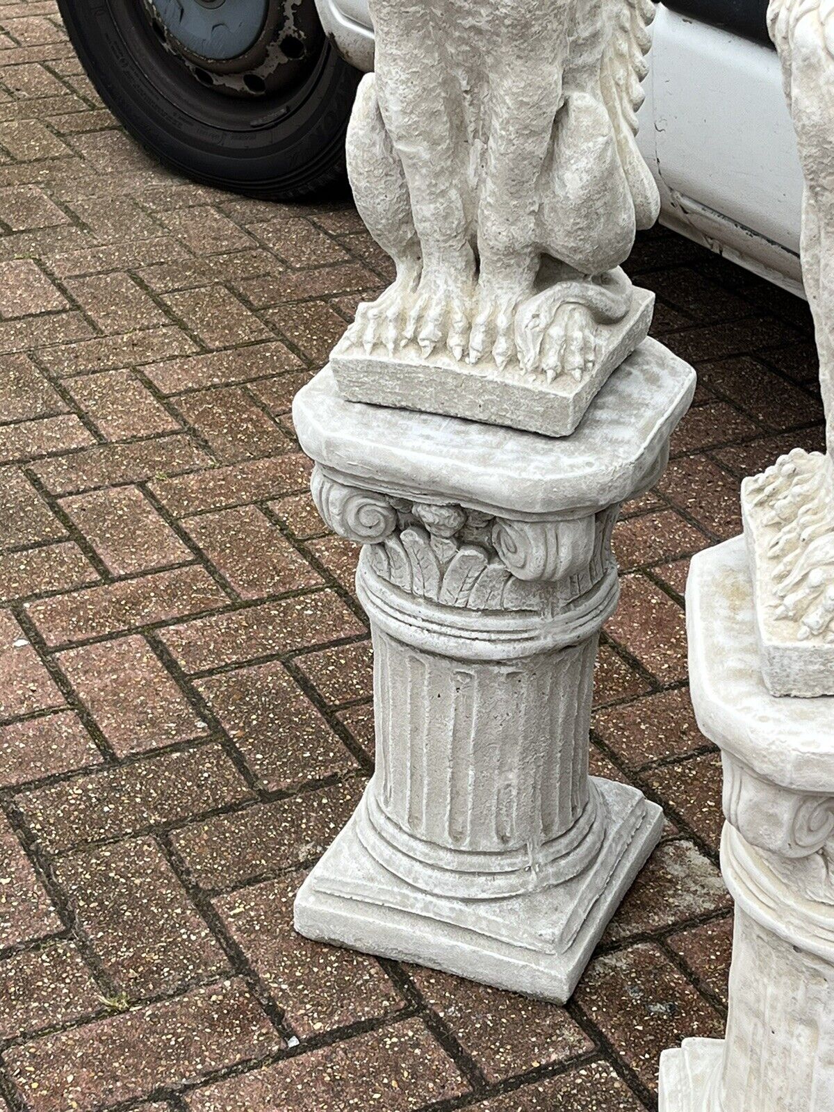 Pair Of Griffins On Architectural Columns