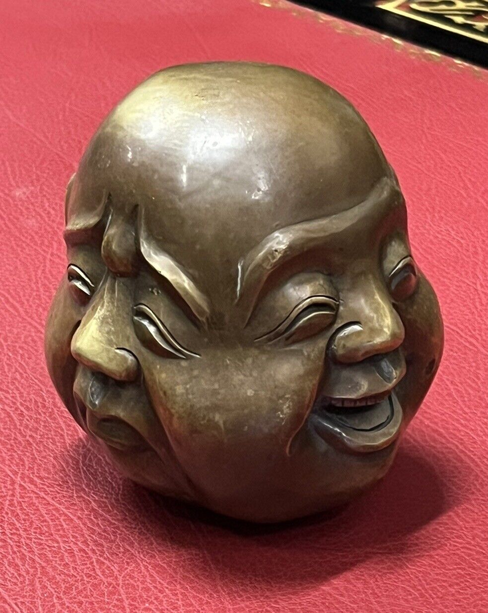 Bronze Four Faces Paperweight