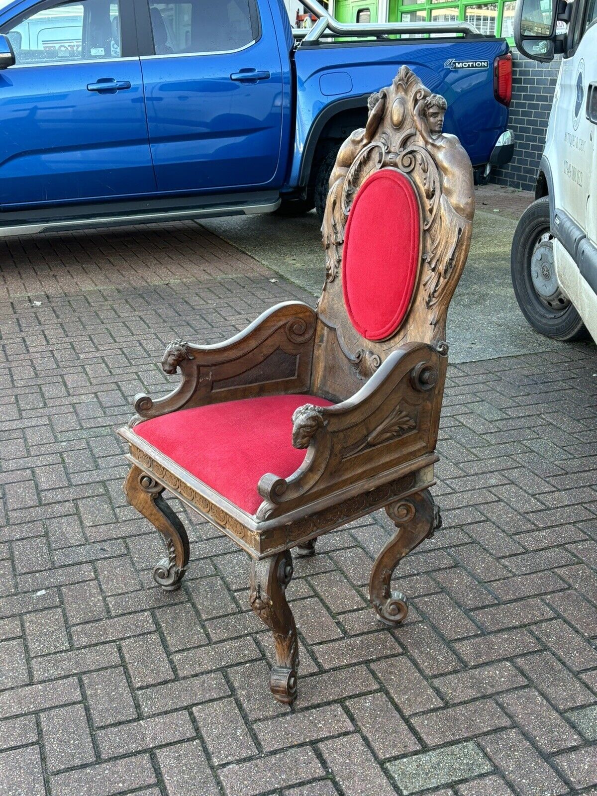 Antique Walnut Country House Library Armchair. Carved Mythical Figures.