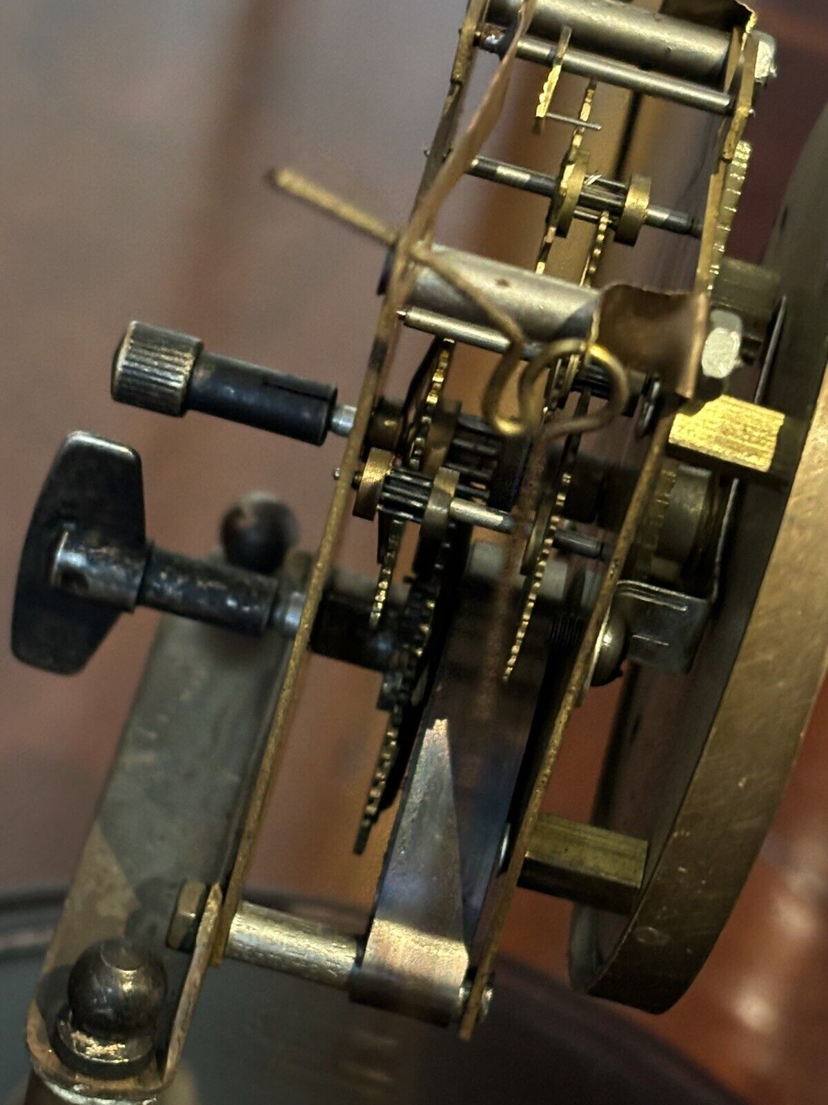 Skeleton Clock In Case With Swinging Monkey Pendulum.