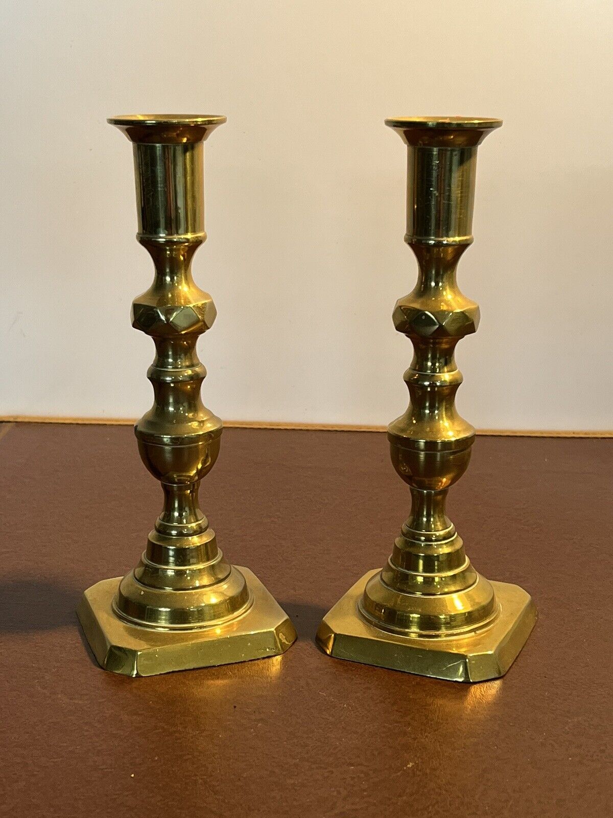 Antique Brass Candlesticks. 19.5 cms tall.