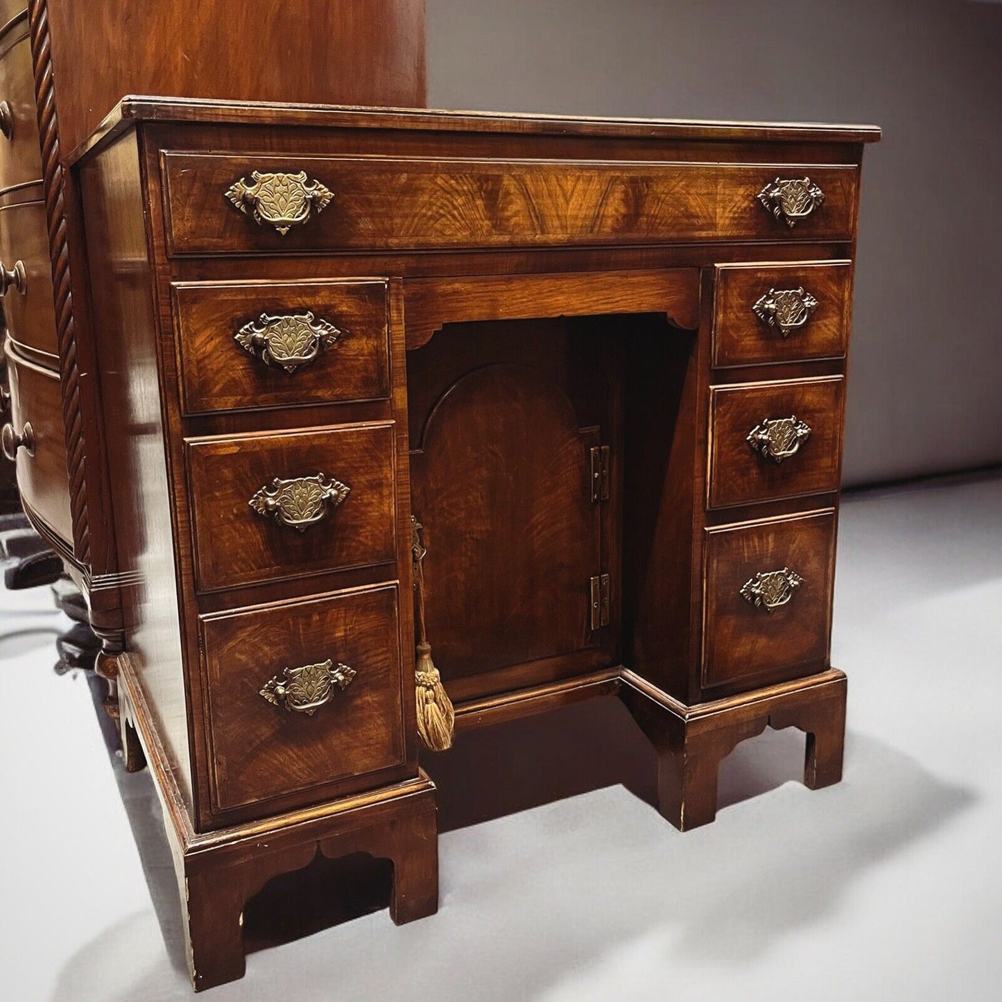 Walnut Kneehole Desk, Bracket Feet With Brass Handles.