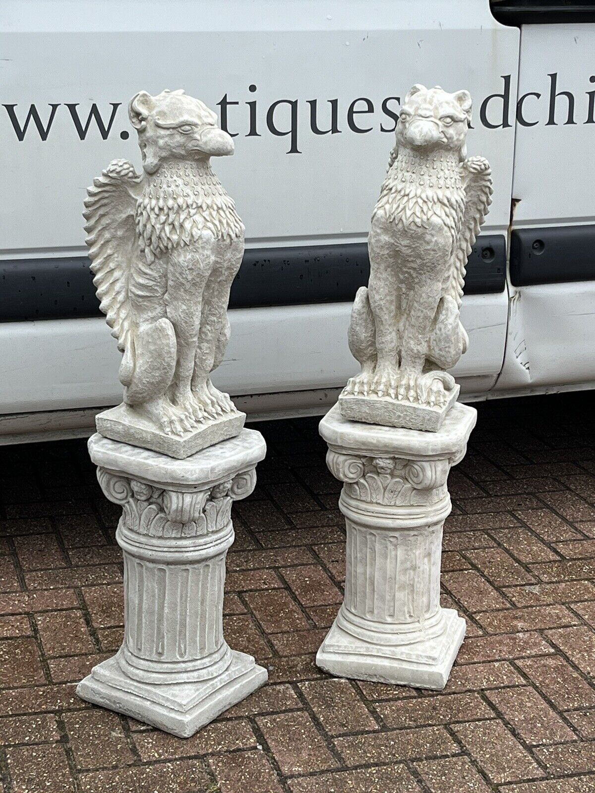 Pair Of Griffins On Architectural Columns