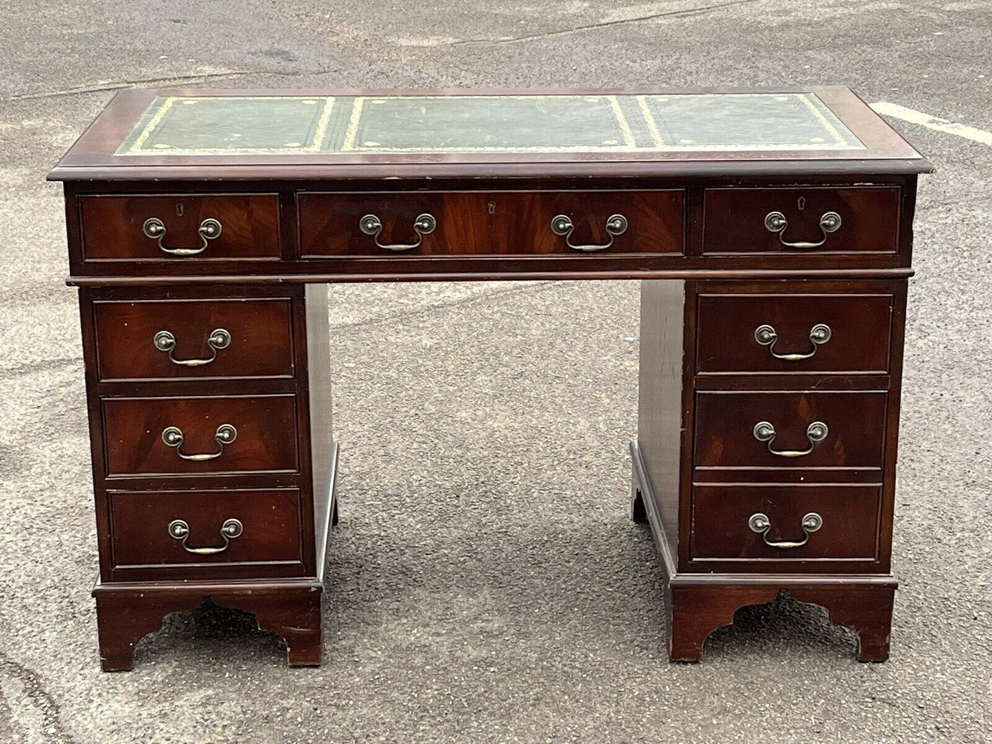 Pedestal Desk In Flame Veneer Mahogany With Green Leather Top.