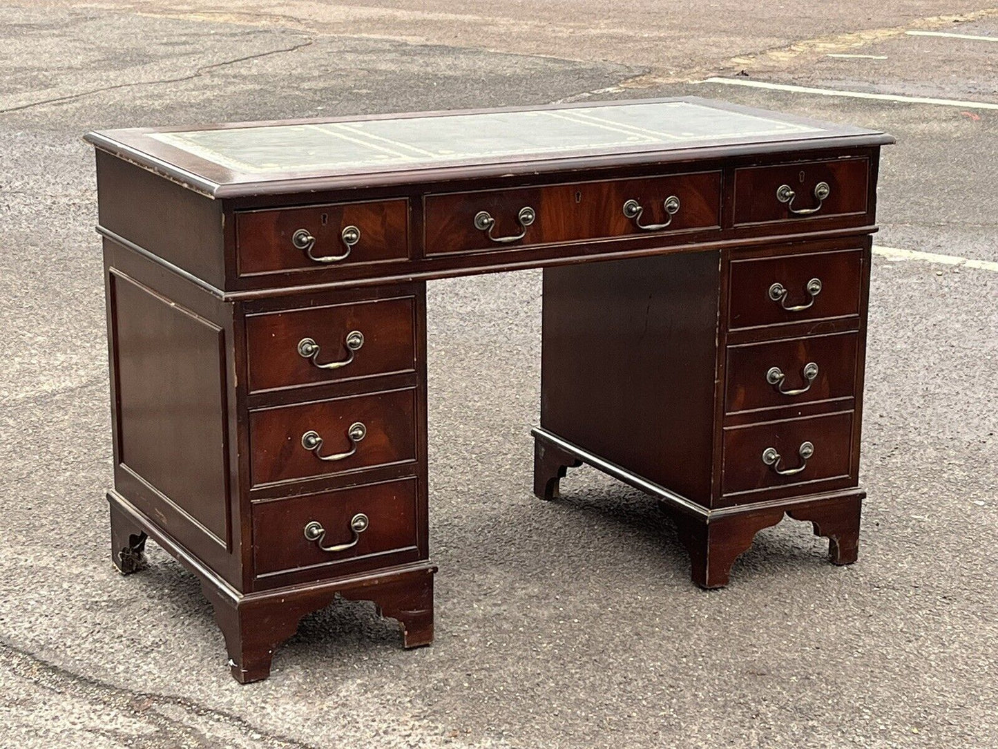 Pedestal Desk In Flame Veneer Mahogany With Green Leather Top.