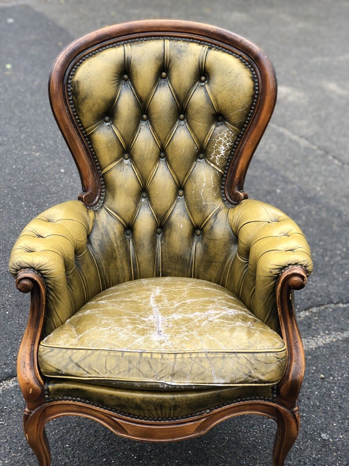 Green Leather Buttoned Back Armchair.