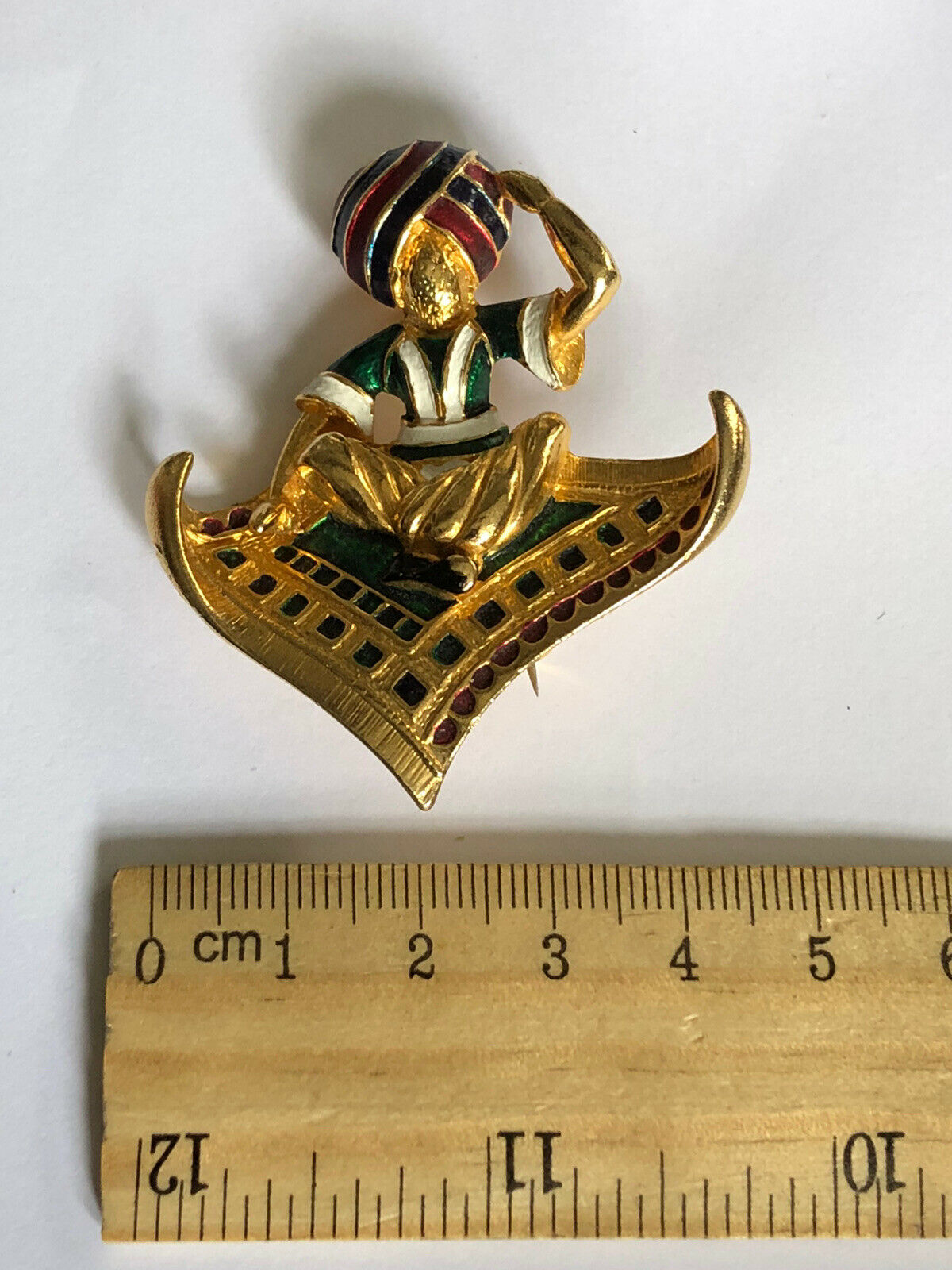 Vintage Gold Tone Enamelled Man On Flying Carpet