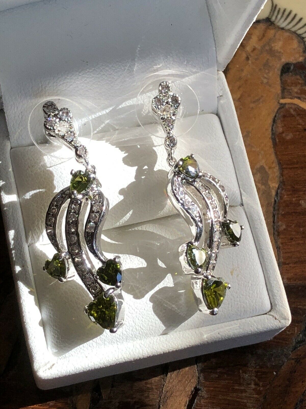 Vintage 1980s Rhodium Plated Green Heart Cubic Zirconia Drop Earrings