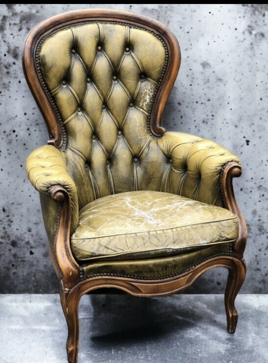 Green Leather Buttoned Back Armchair.