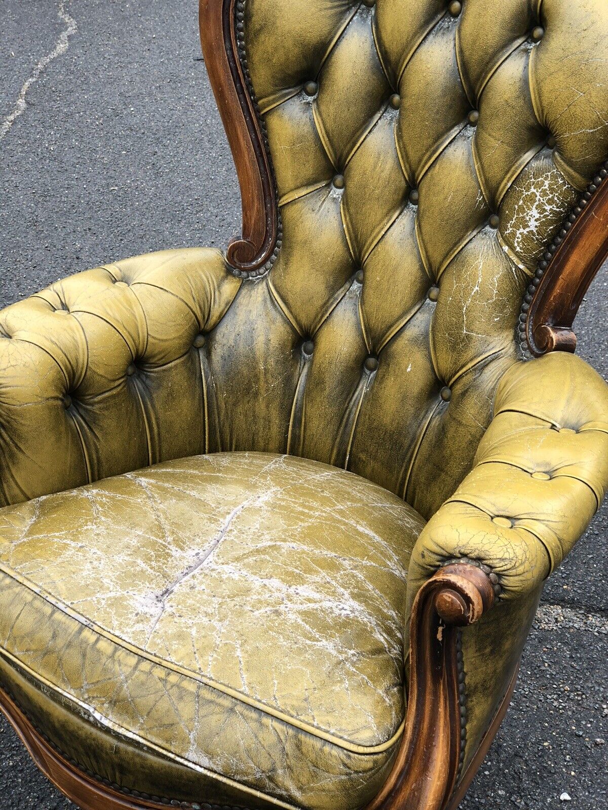 Green Leather Buttoned Back Armchair.