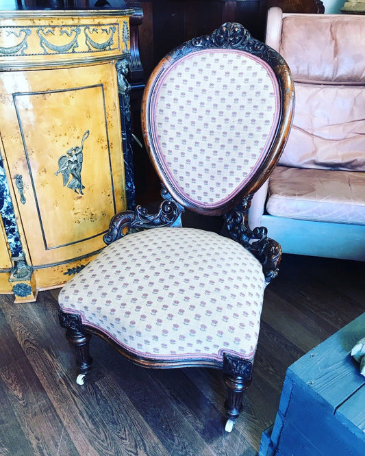 Victorian Mahogany Chair. On White Porcelain Castors