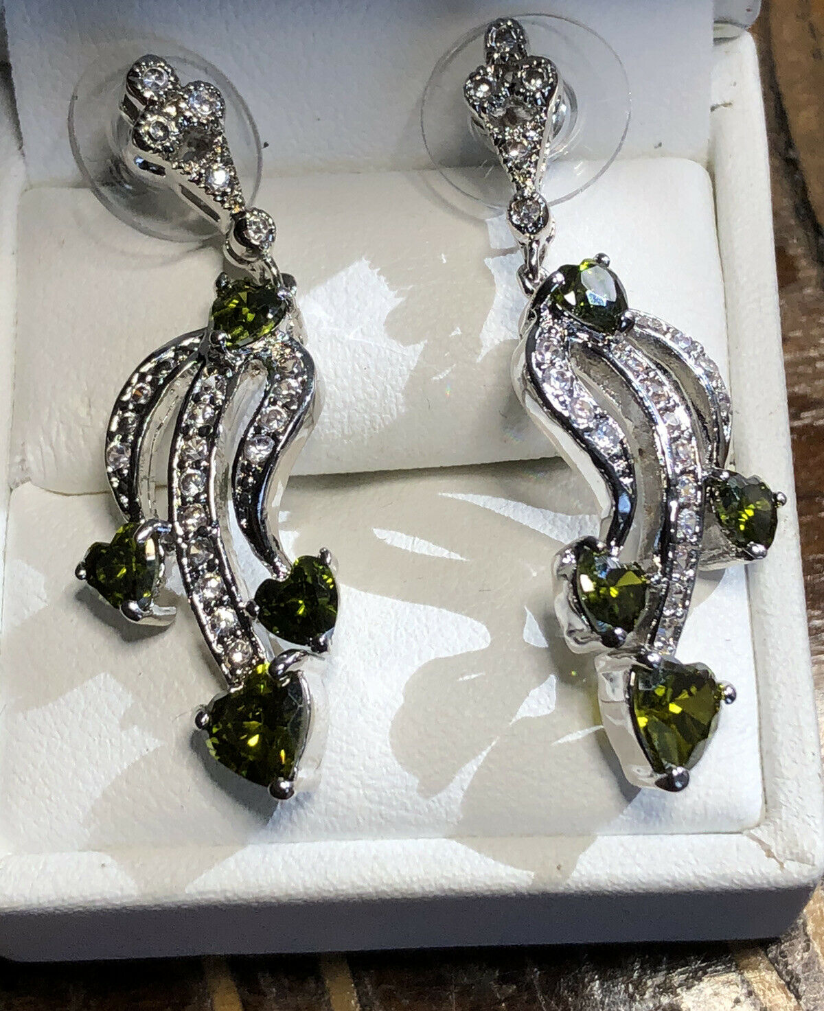 Vintage 1980s Rhodium Plated Green Heart Cubic Zirconia Drop Earrings