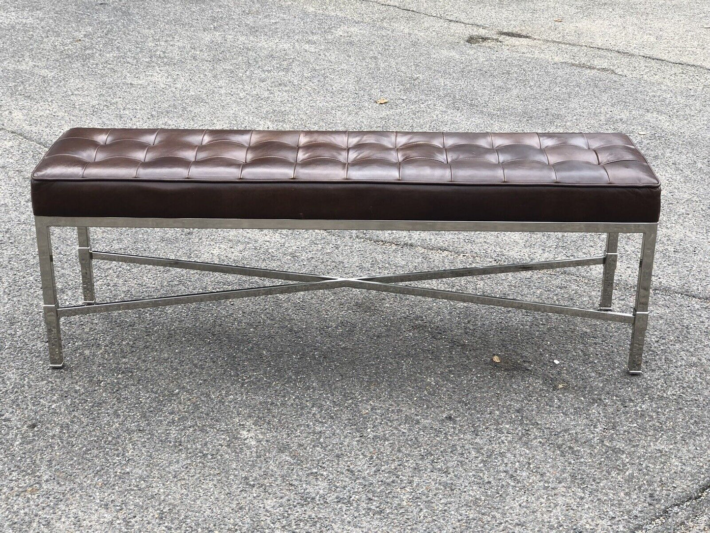 Tan Leather Designer Stool With chrome Legs.