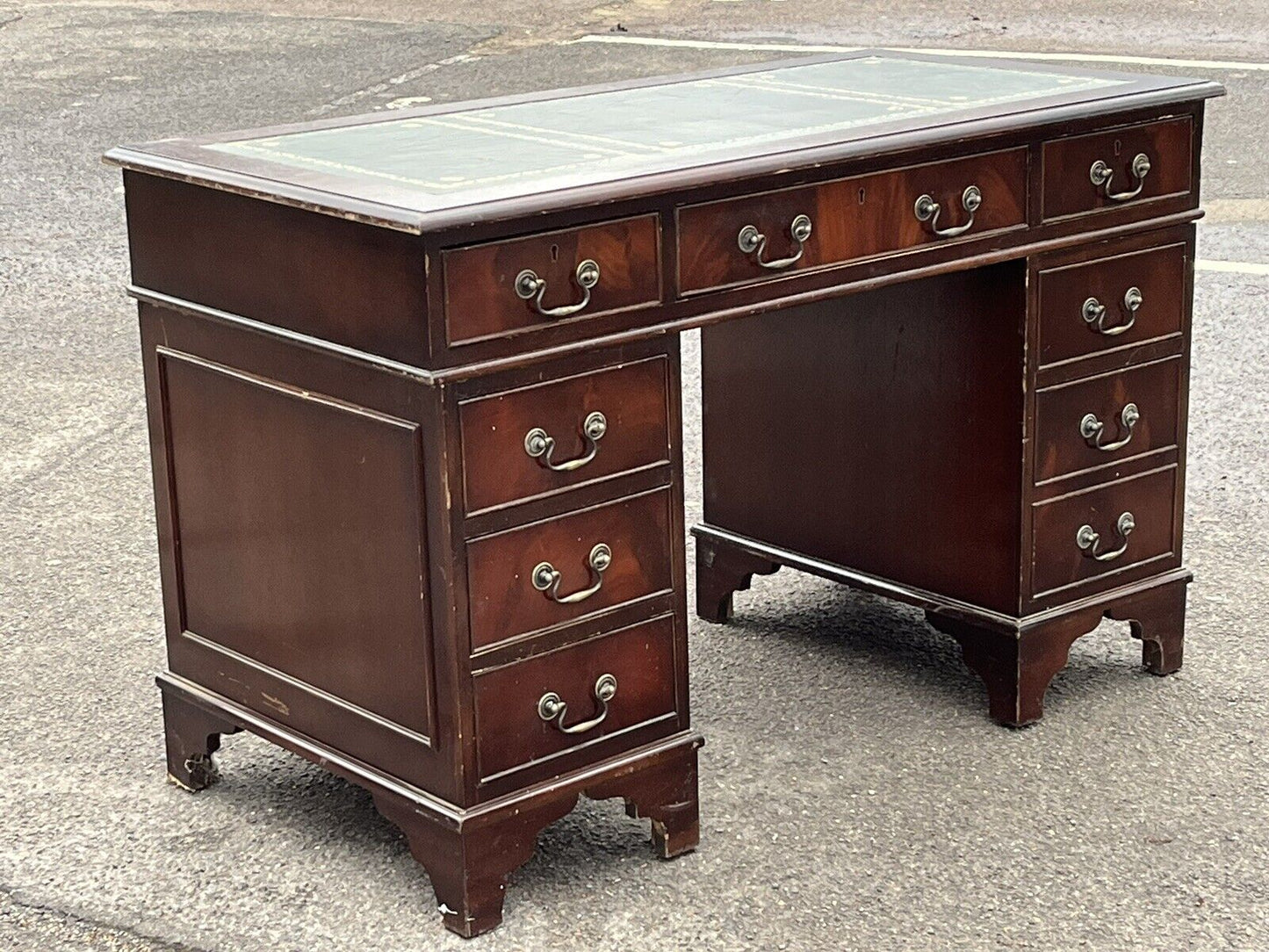 Pedestal Desk In Flame Veneer Mahogany With Green Leather Top.