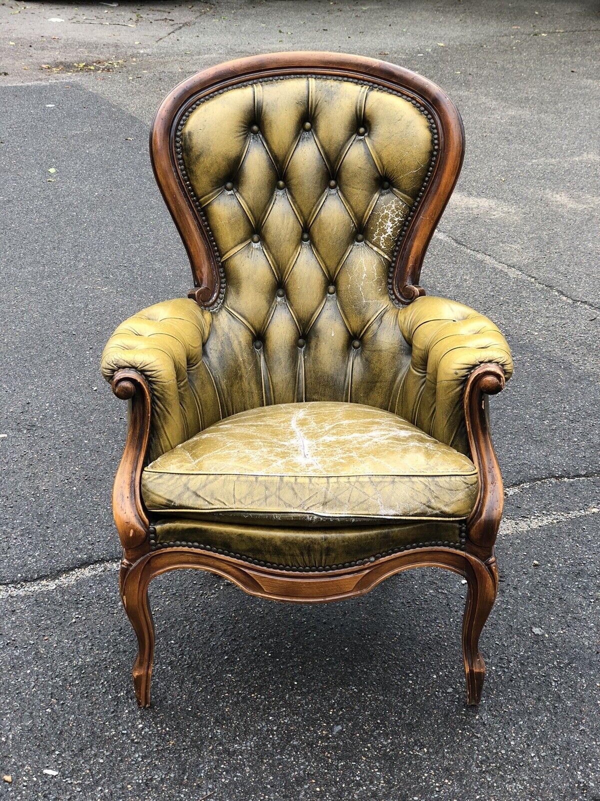 Green Leather Buttoned Back Armchair.