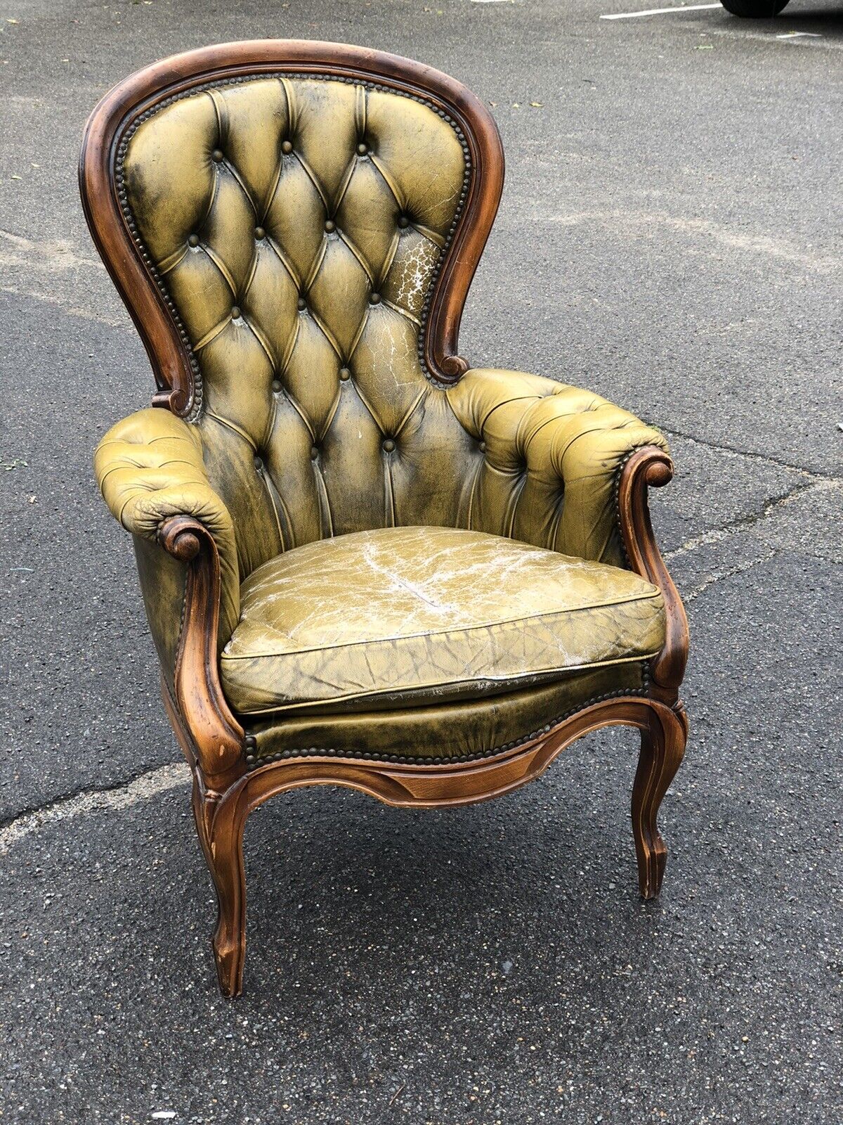 Green Leather Buttoned Back Armchair.